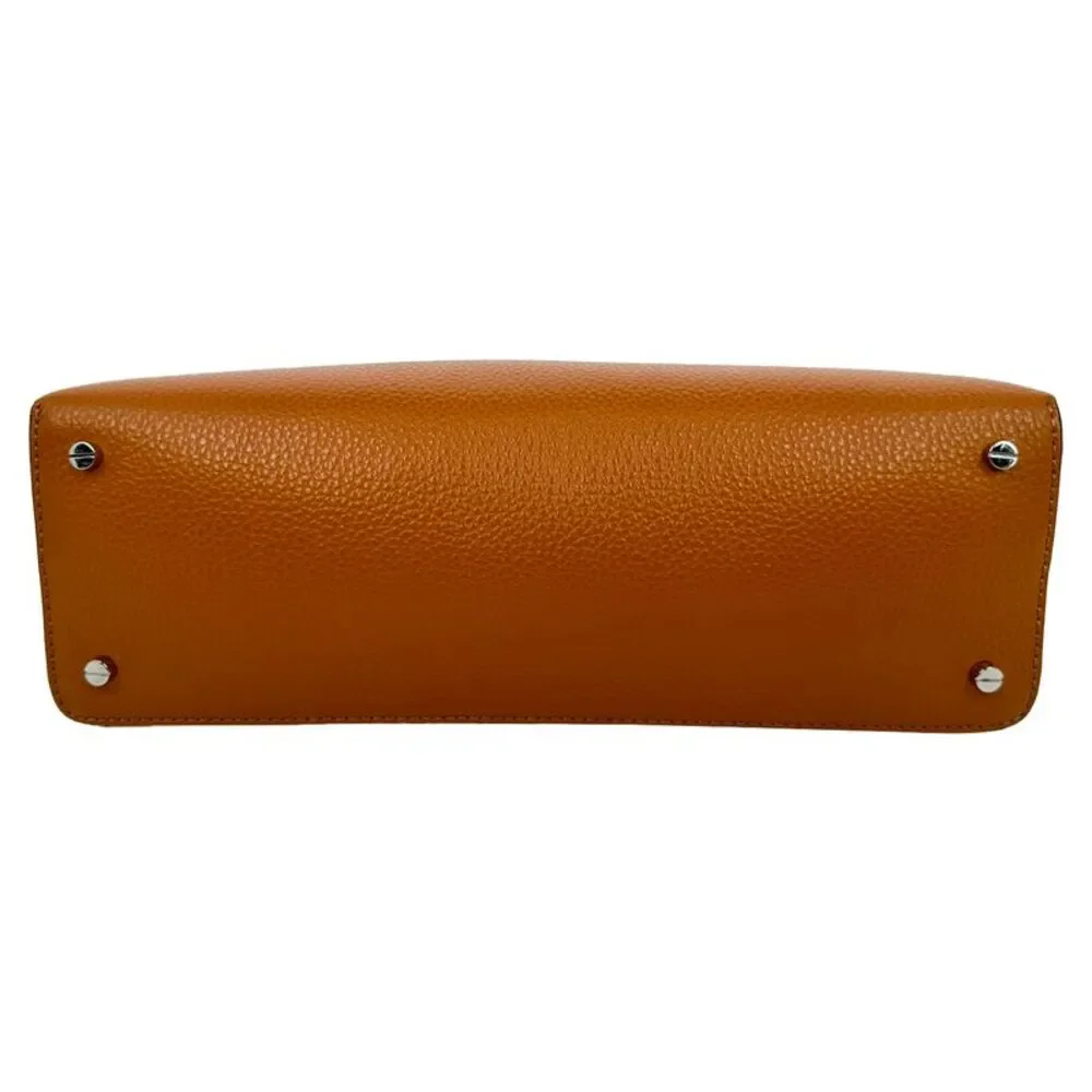 Totême T-Lock Grained-Leather Clutch in Tan Brown Leather